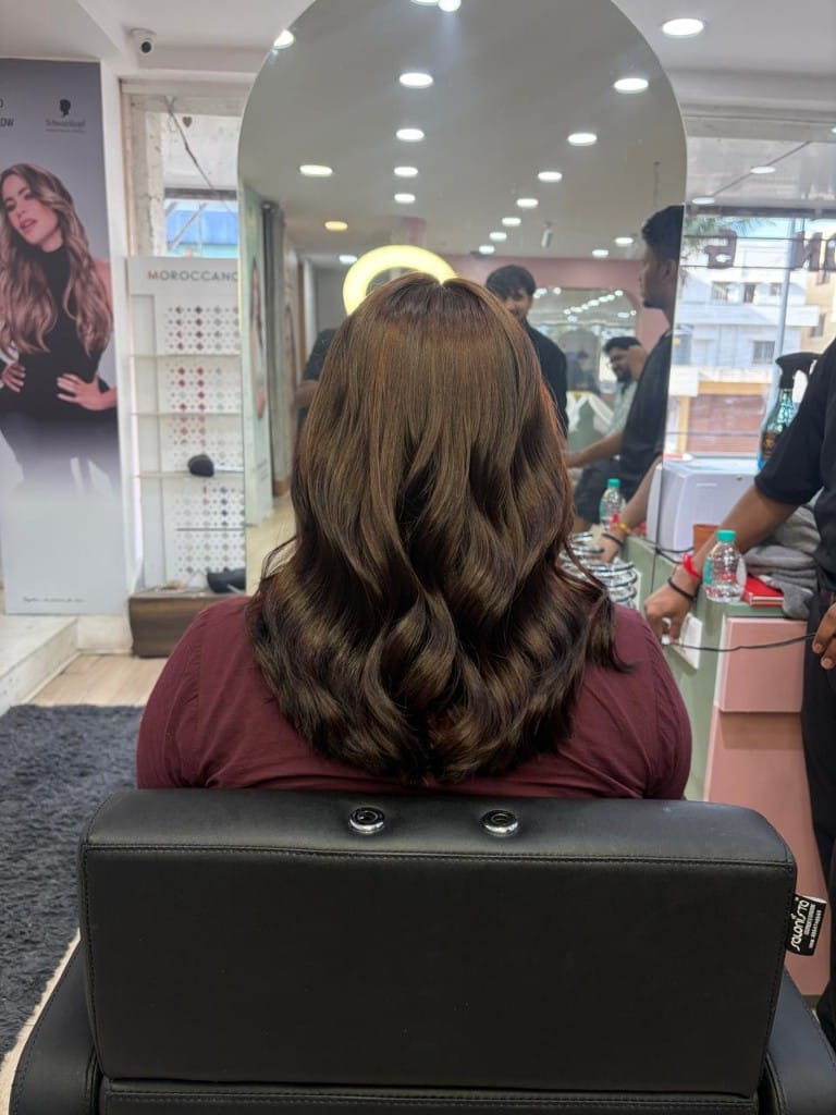 Chocolate brown with honey highlights and soft waves